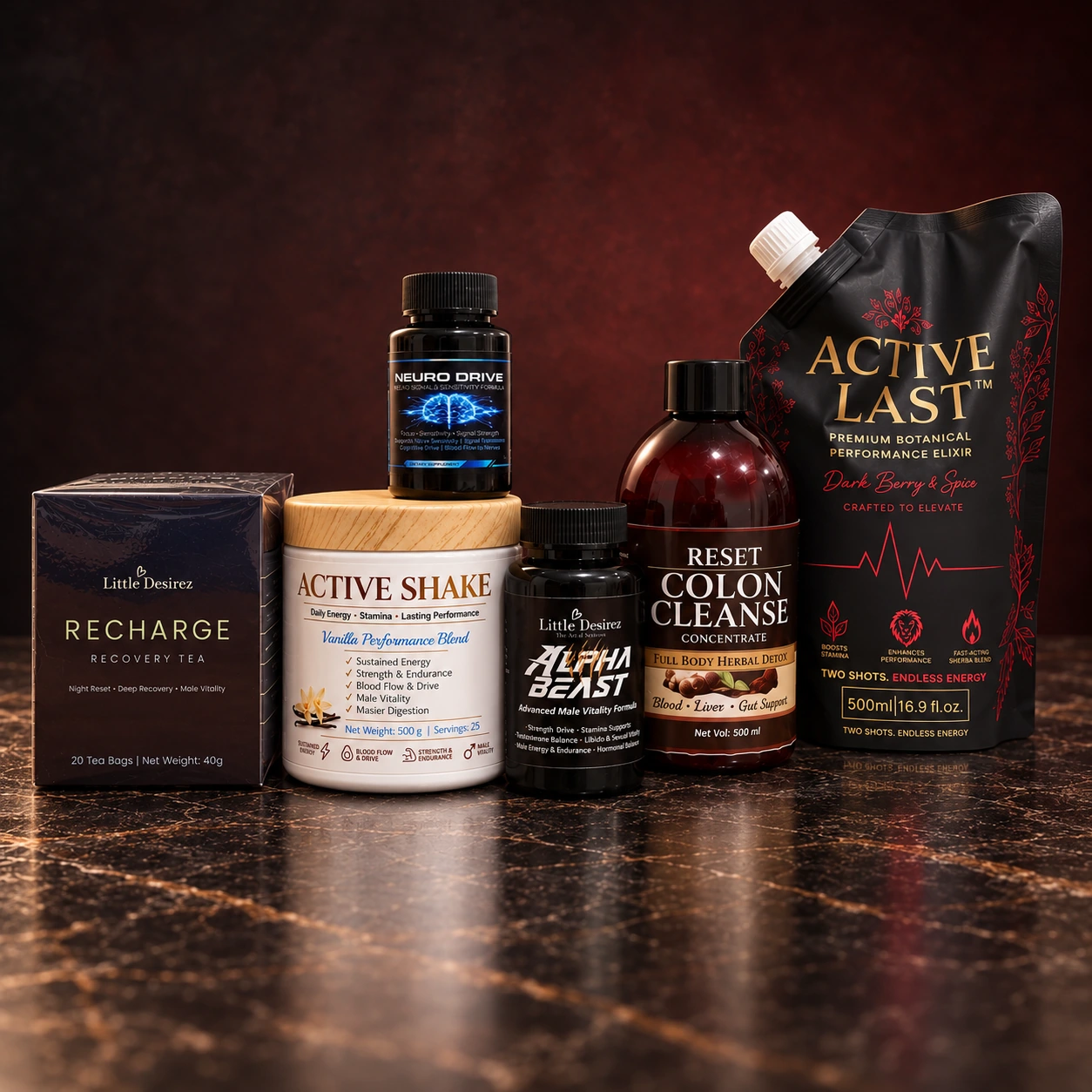 The six Little Desirez Complete Man Stack products on dark stone